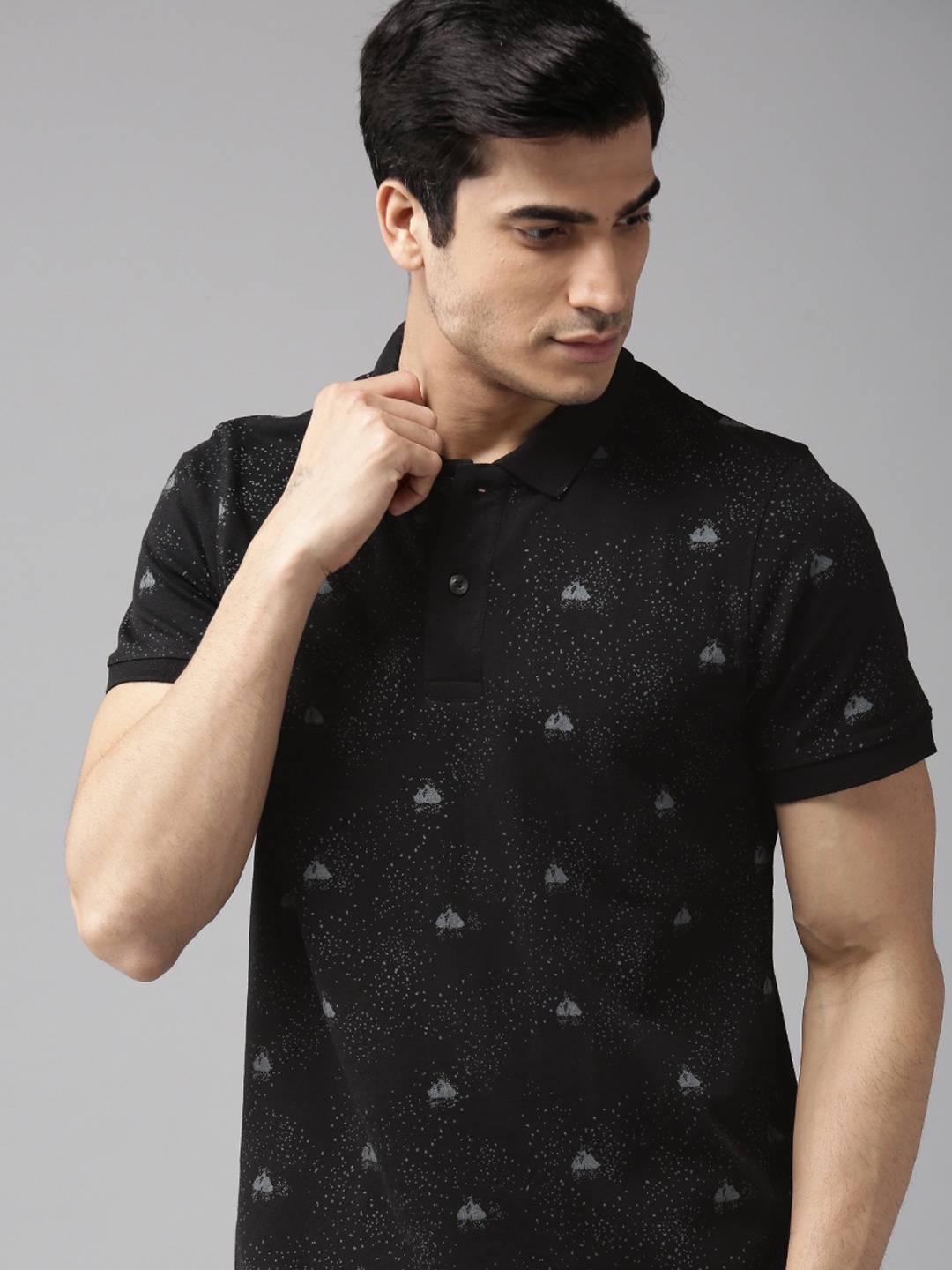 

The Roadster Lifestyle Co Men Black & Grey All Over Printed Polo Collar T-shirt