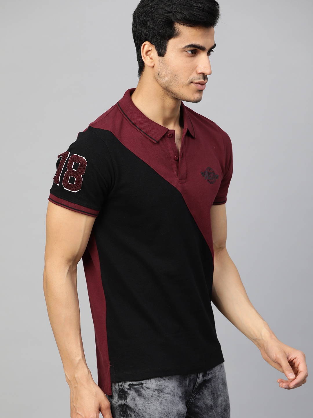 

The Roadster Lifestyle Co Men Black & Burgundy Colourblocked Polo Collar T-shirt