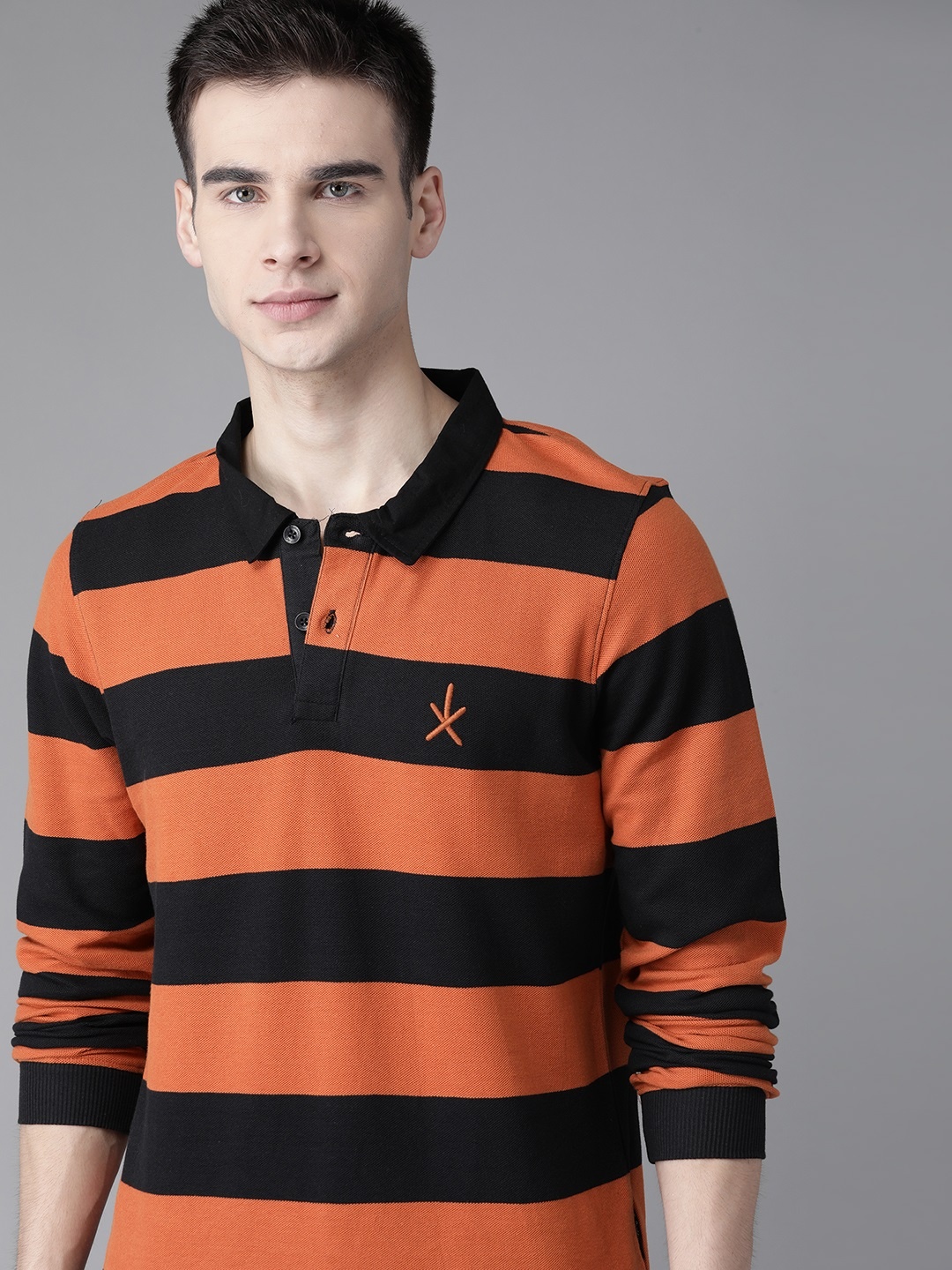 

The Roadster Lifestyle Co Men Black & Orange Pure Cotton Striped Polo Collar T-shirt
