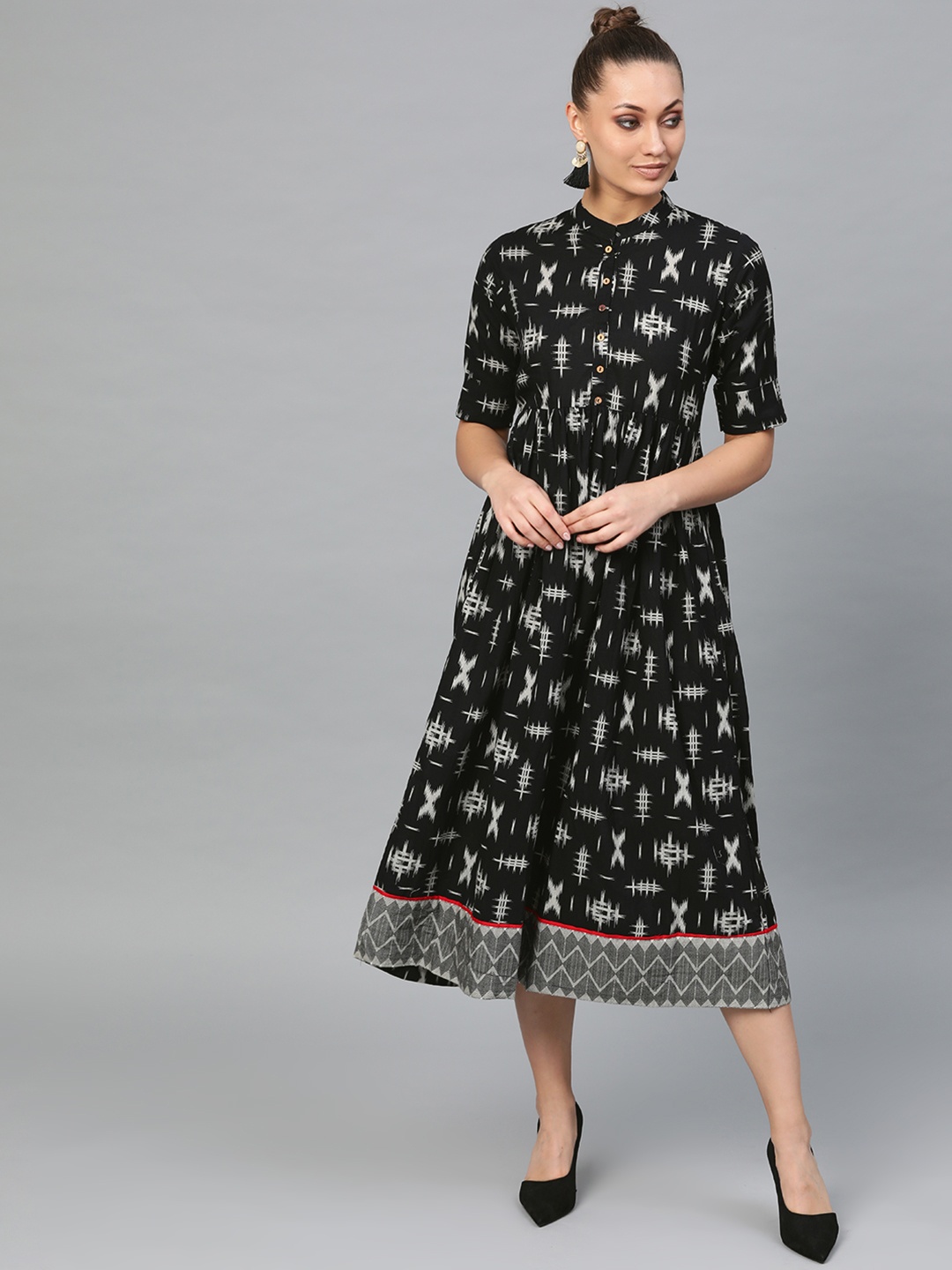 

Indo Era Women Black Printed Midi Fit and Flare Dress