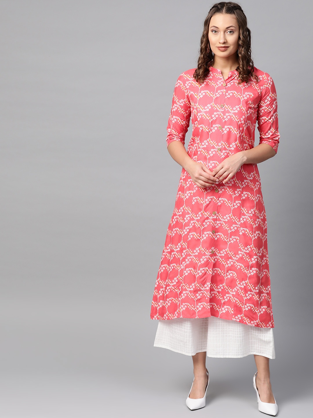 

Ishin Women Coral Pink & White Printed Kurta with Palazzos