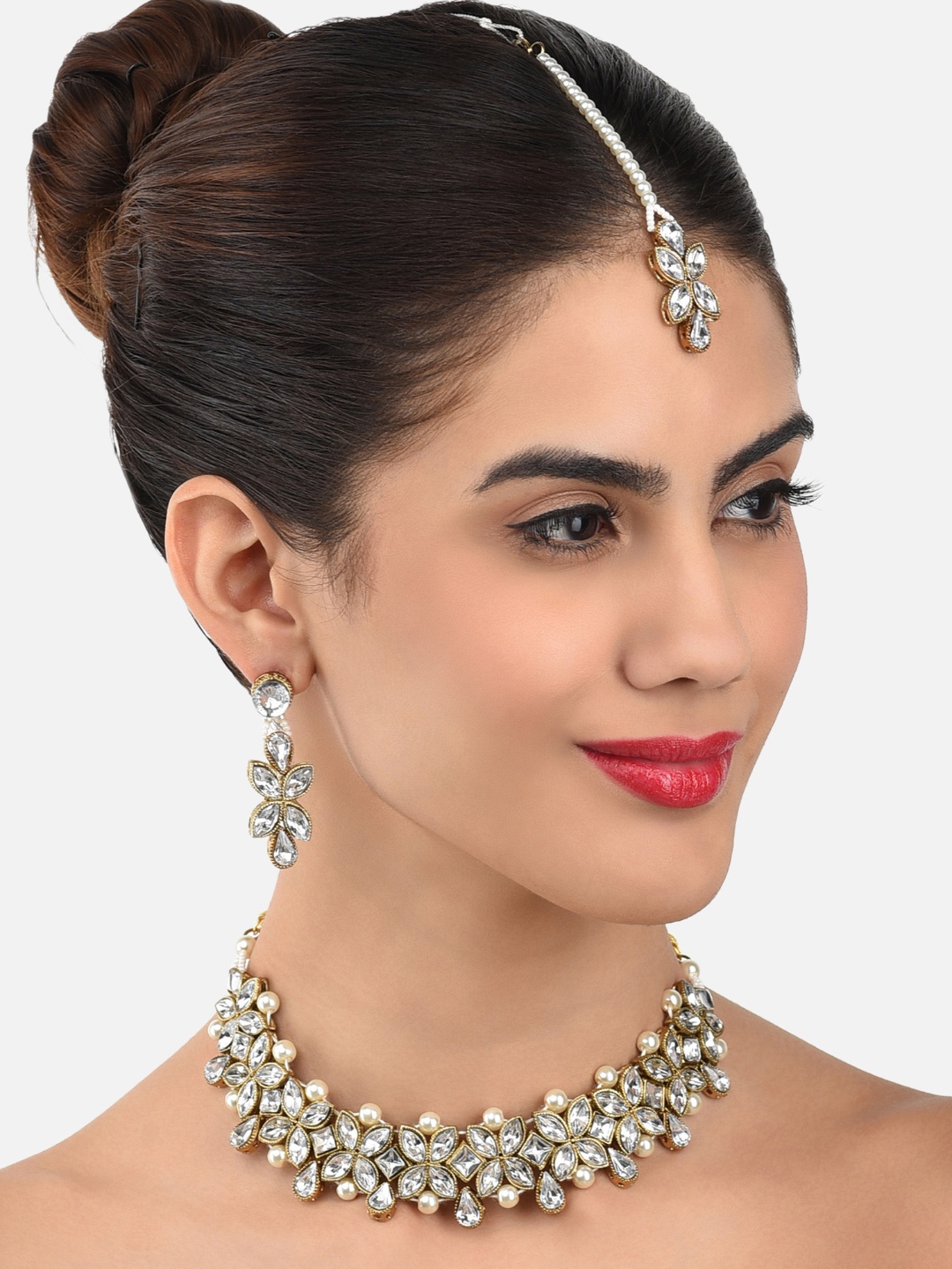 

Zaveri Pearls Gold-Plated Stone Studded Pearl Choker Jewellery Set