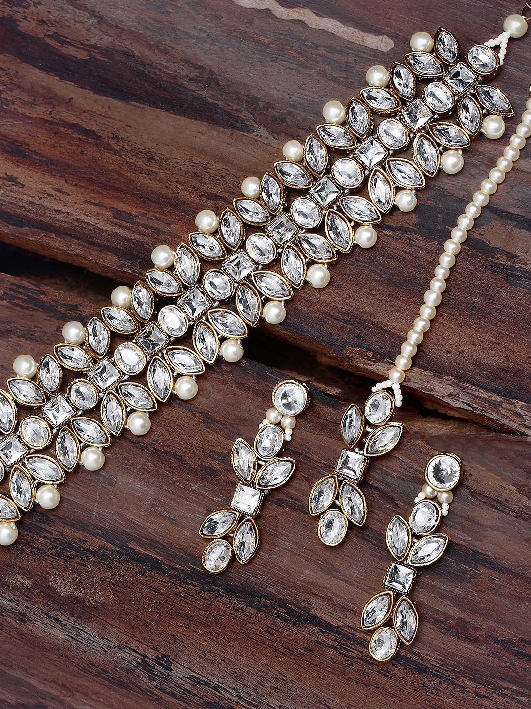 

Zaveri Pearls Gold-Toned & White Stone & Pearl Studded Choker Jewellery Set