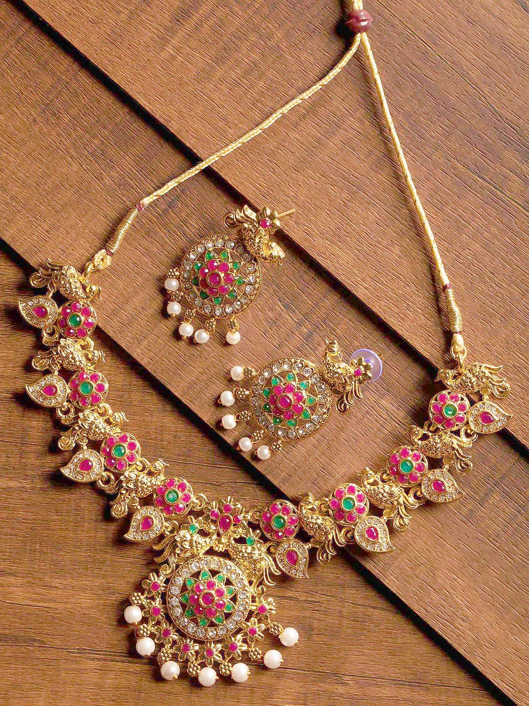 

Zaveri Pearls Gold-Plated & Red Jewellery Set