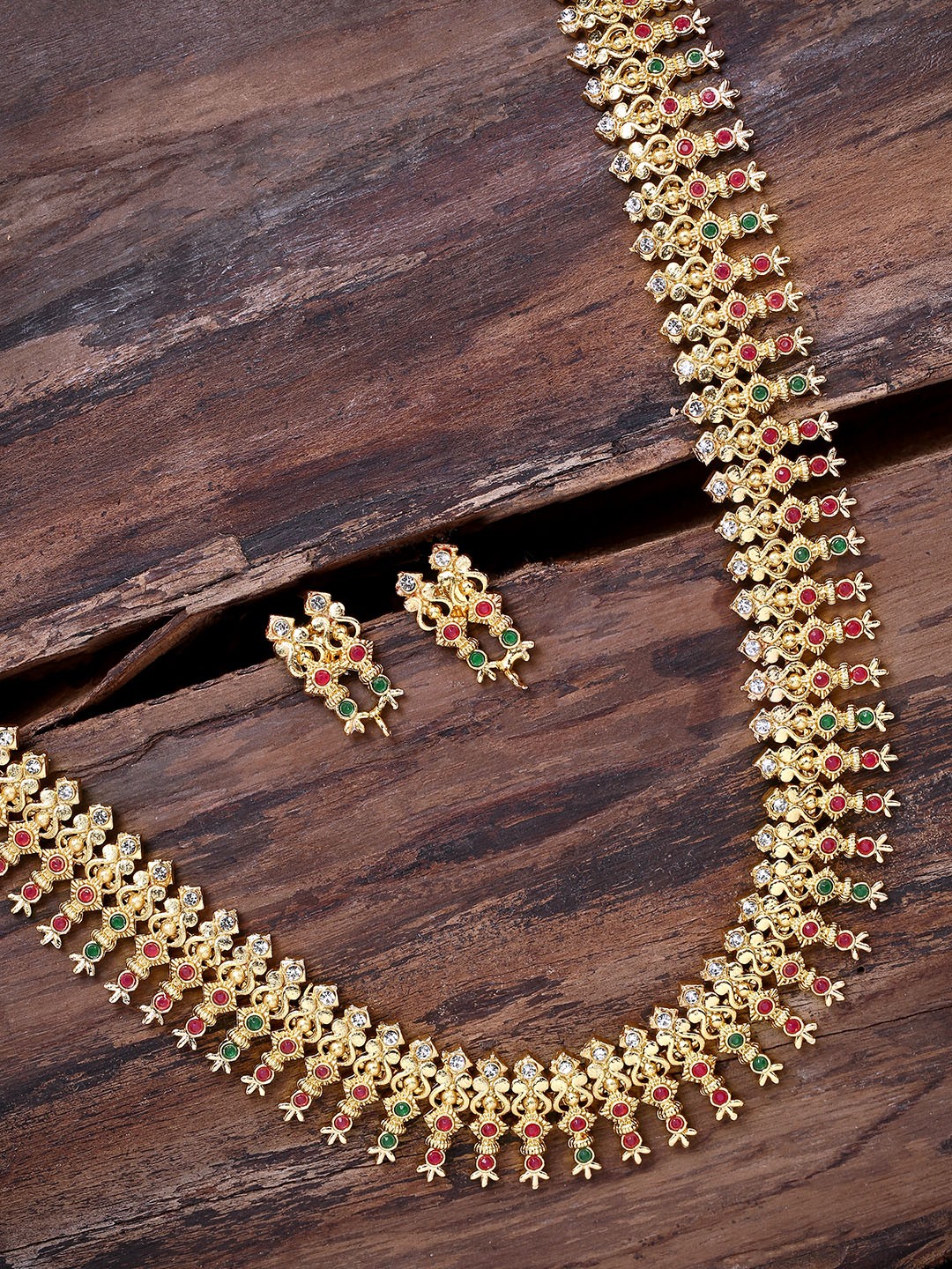 

Zaveri Pearls Gold Plated & Red Ethnic Alluring Antique Jewellery Set