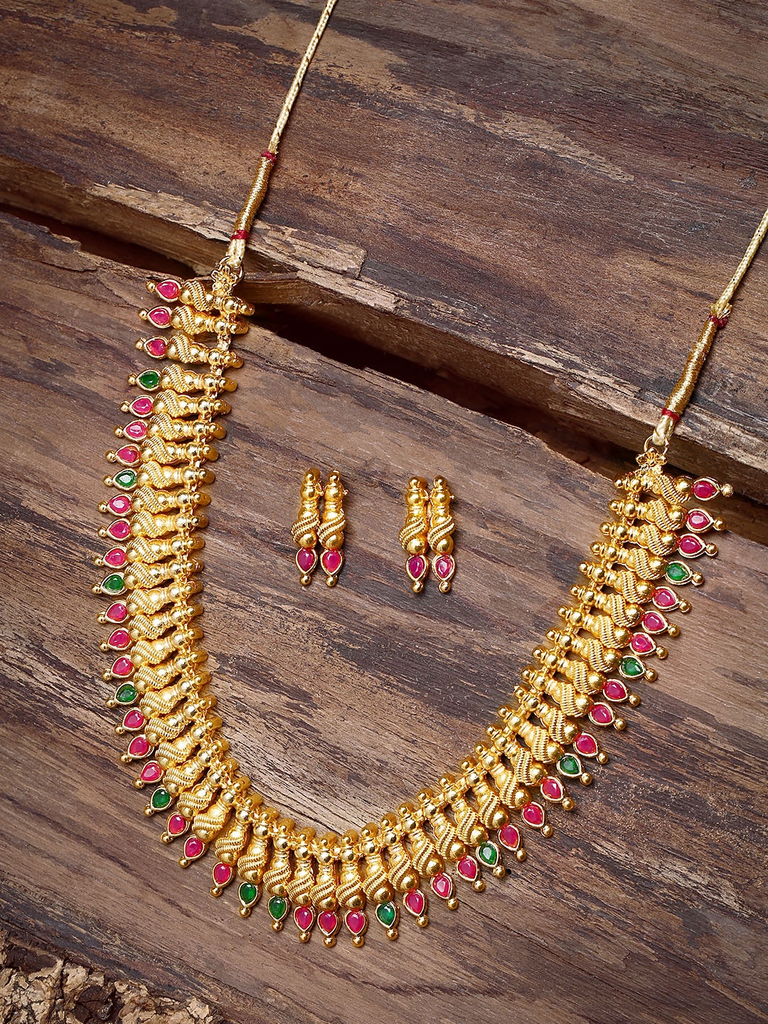 

Zaveri Pearls Gold-Plated & Red Jewellery Set