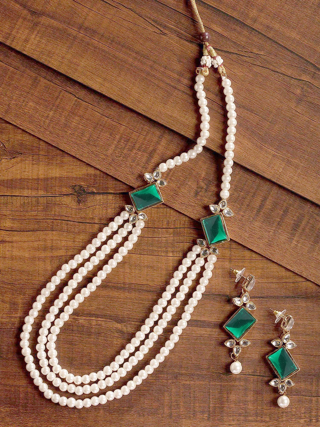 

Zaveri Pearls White & Green Pearl & Stone Studded Multi Layered Jewellery Set