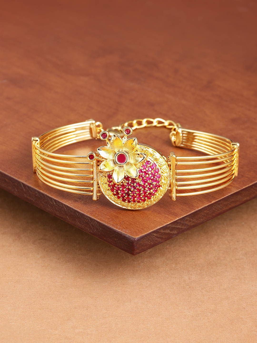 

Zaveri Pearls Gold-Toned & Pink Cubic Zirconia Studded Kada Bracelet