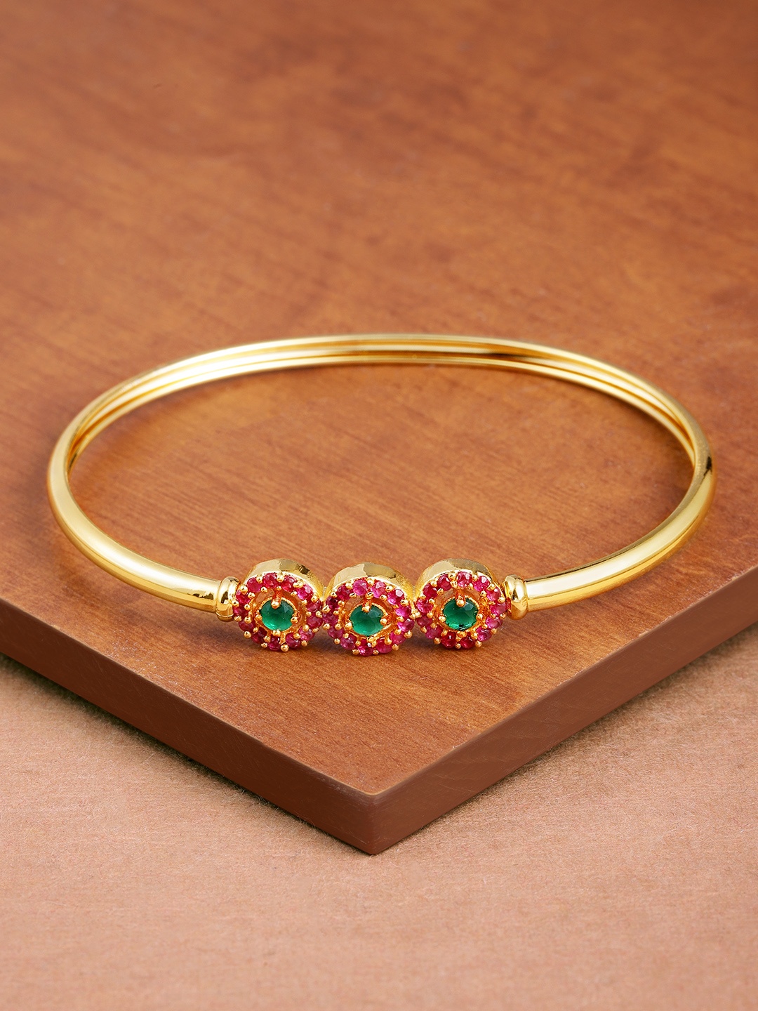 

Zaveri Pearls Gold-Toned & Pink Cubic Zirconia Studded Kada Bracelet
