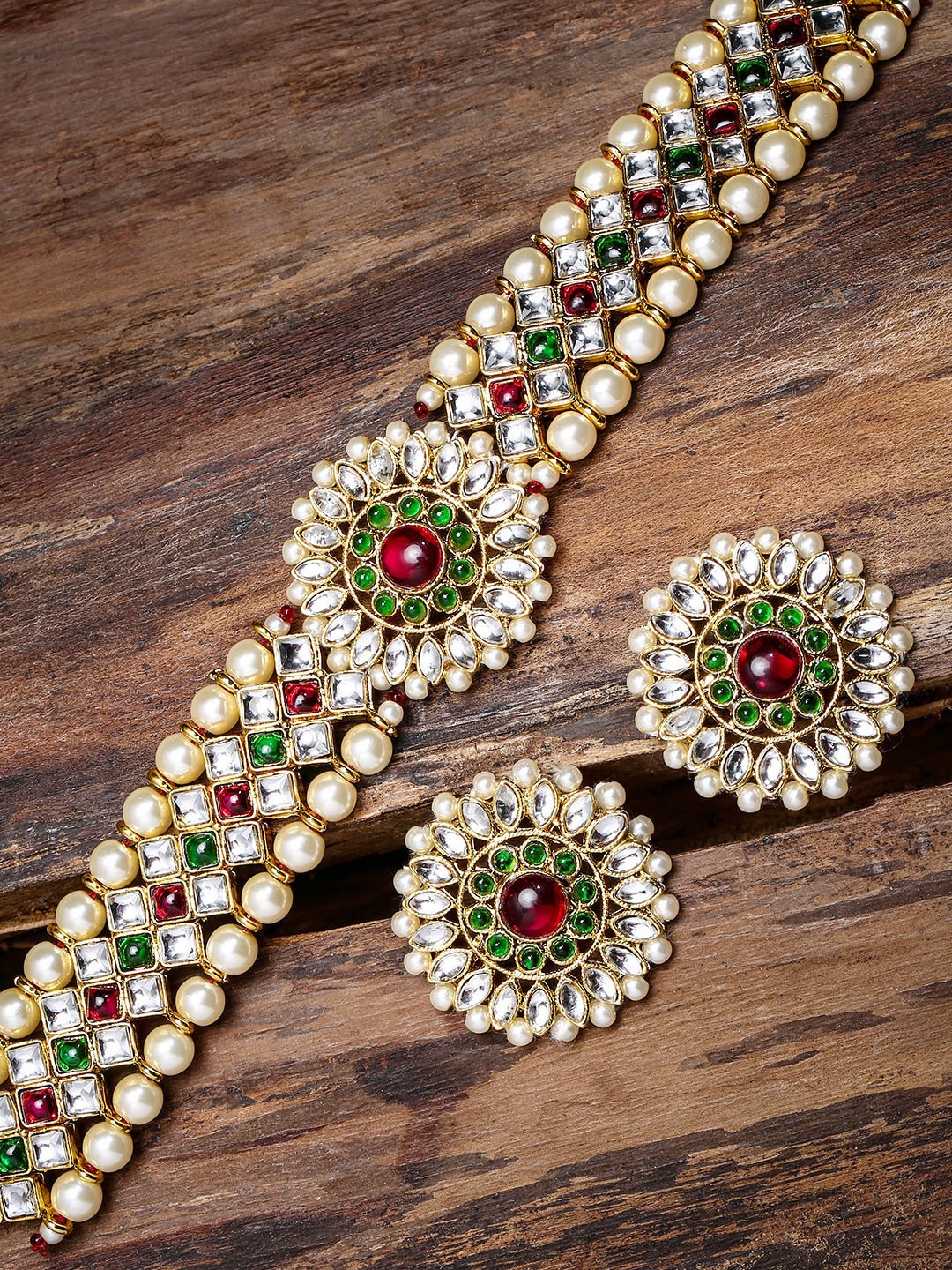 

Zaveri Pearls Gold-Plated & Red Kundan & Pearl Studded Jewellery Set