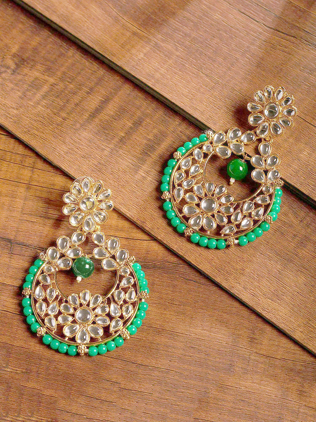 

Zaveri Pearls Gold-Plated & Green Crescent Shaped Chandbalis