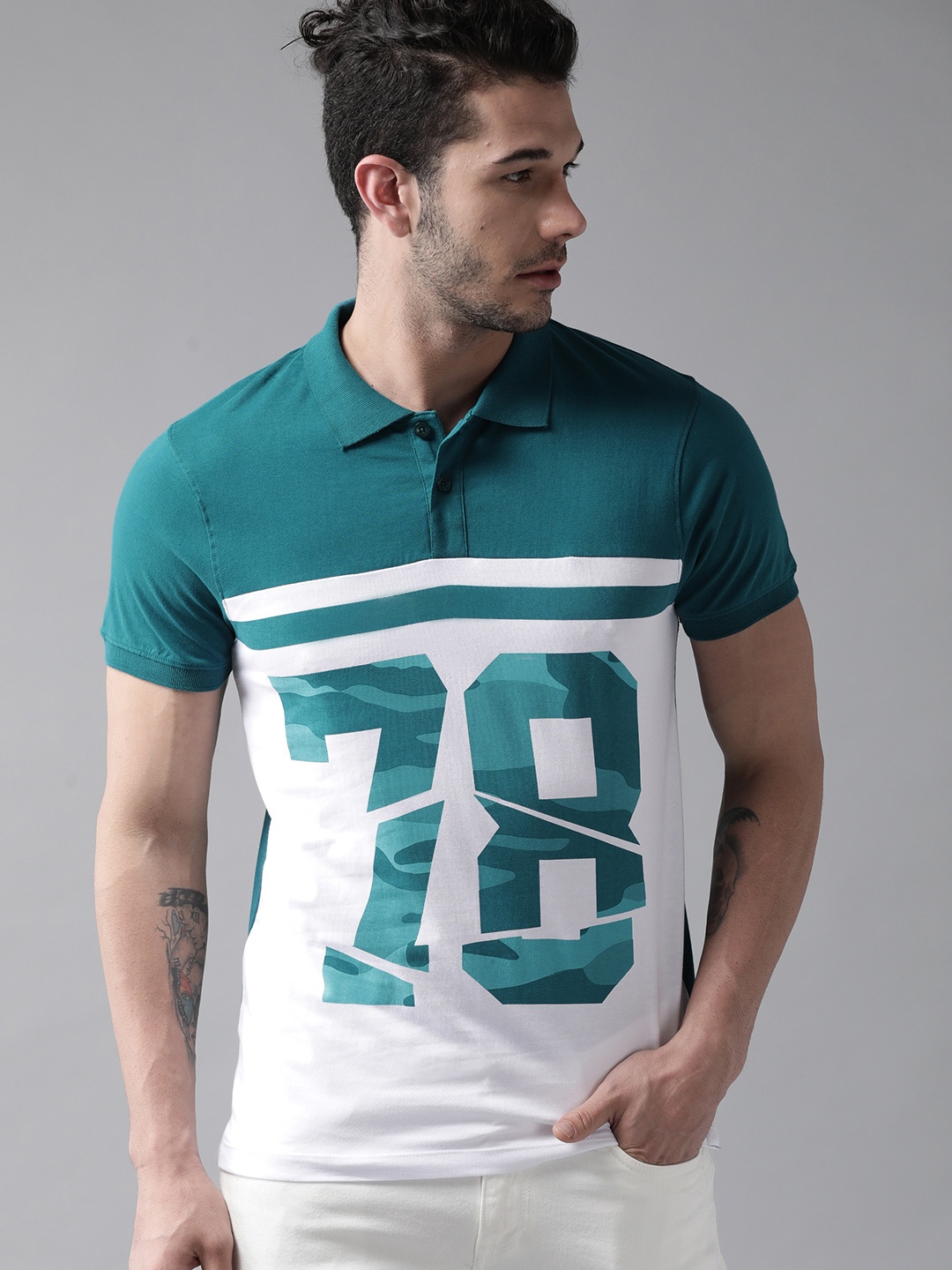 

The Roadster Lifestyle Co Men White & Teal Blue Printed Polo Collar T-shirt