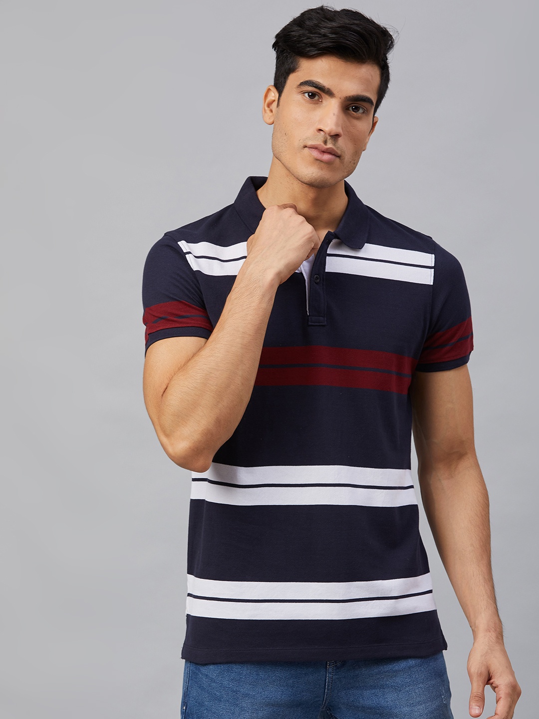 

The Roadster Lifestyle Co Men Navy Blue and White Striped Polo Collar T-shirt