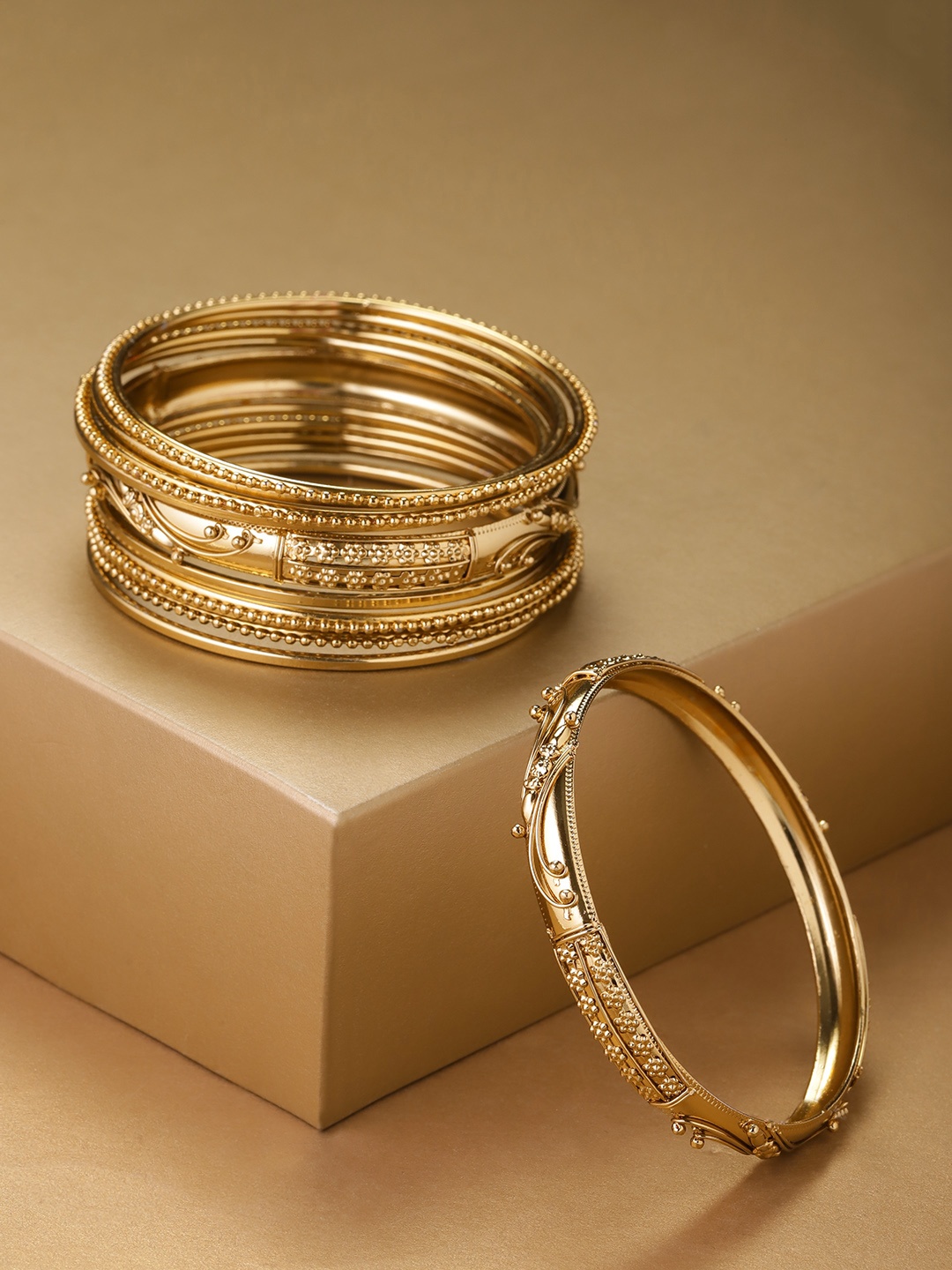 

Priyaasi Set of 11 Antique Gold-Plated Textured Handcrafted Bangles