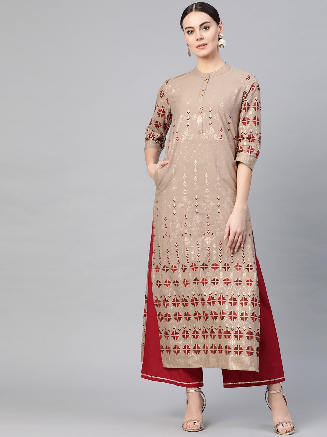

Yuris Women Beige & Golden Printed Straight Kurta