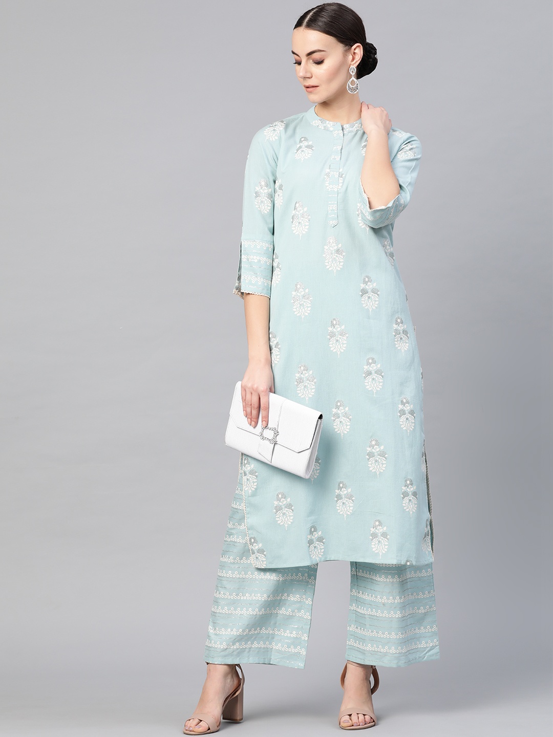 

Yuris Women Blue & White Printed Kurta with Palazzos