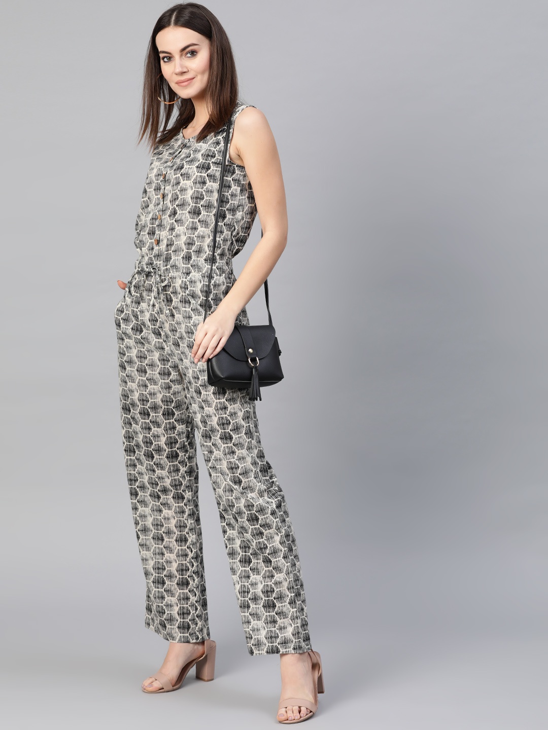 

Yuris Women Cream-Coloured & Black Printed Basic Jumpsuit