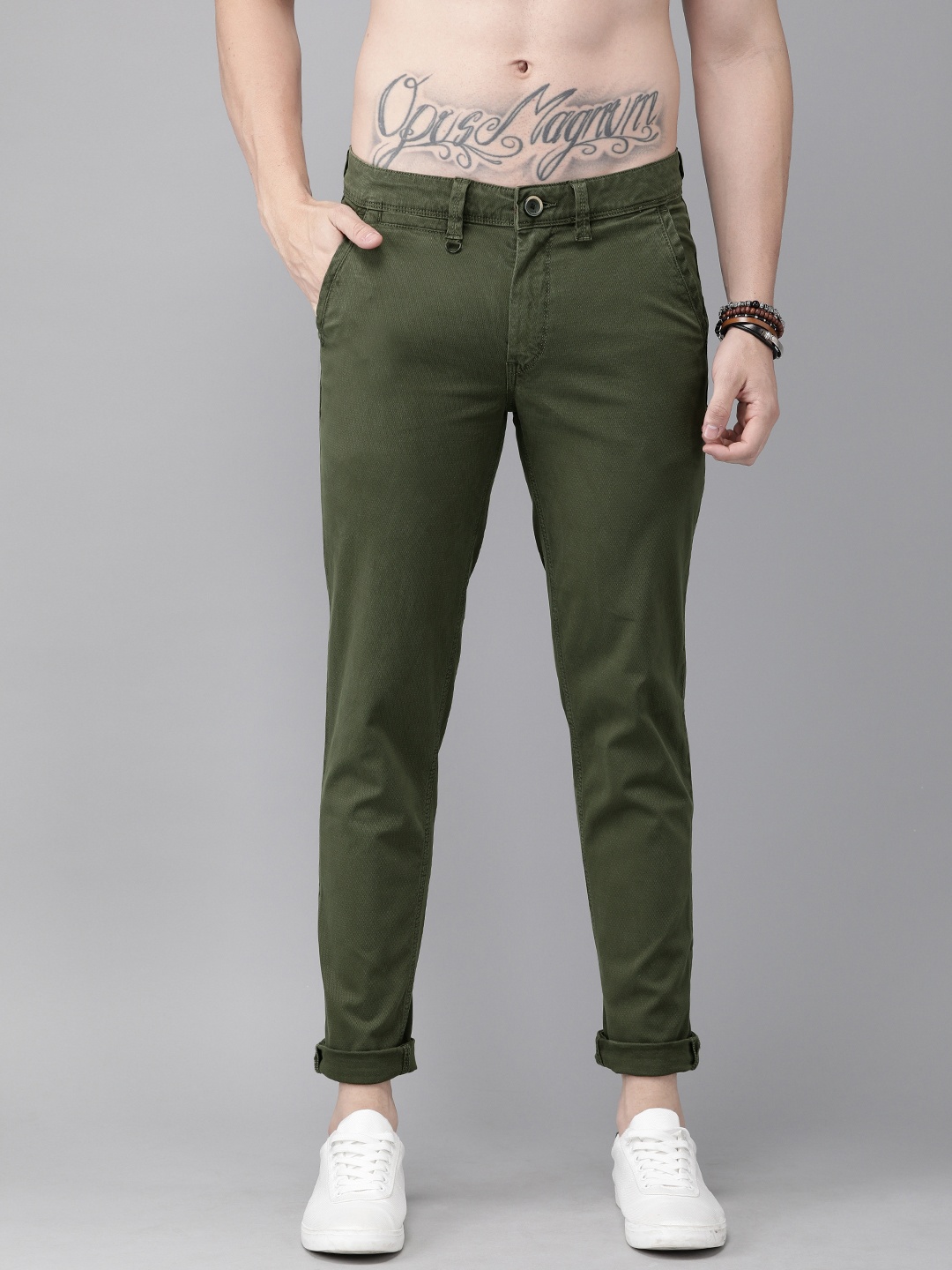 

The Roadster Lifestyle Co Men Olive Green Regular Fit Self Design Regular Trousers