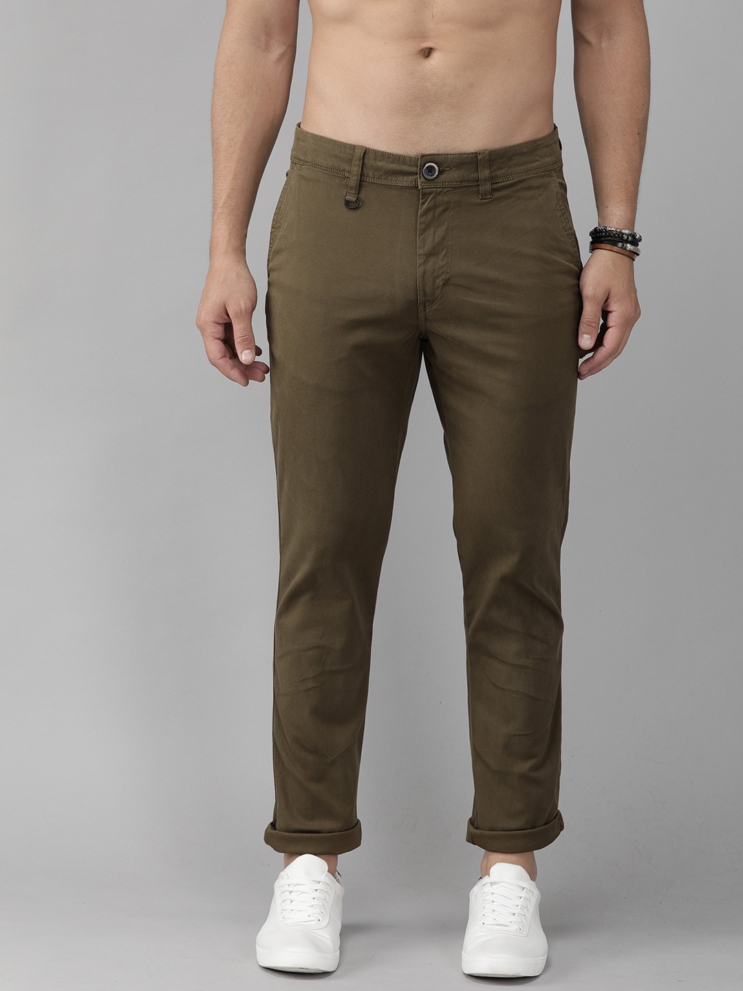 

The Roadster Lifestyle Co Men Olive Green Slim Fit Self Design Regular Trousers