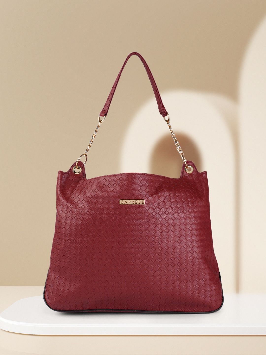 

Caprese Maroon Textured Hobo Bag