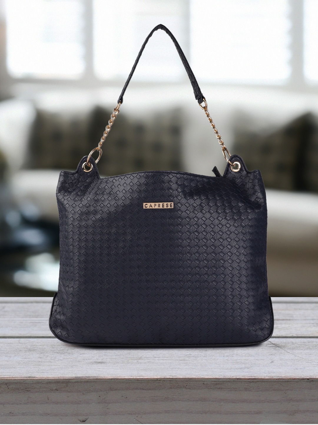 

Caprese Blue Textured Hobo Bag