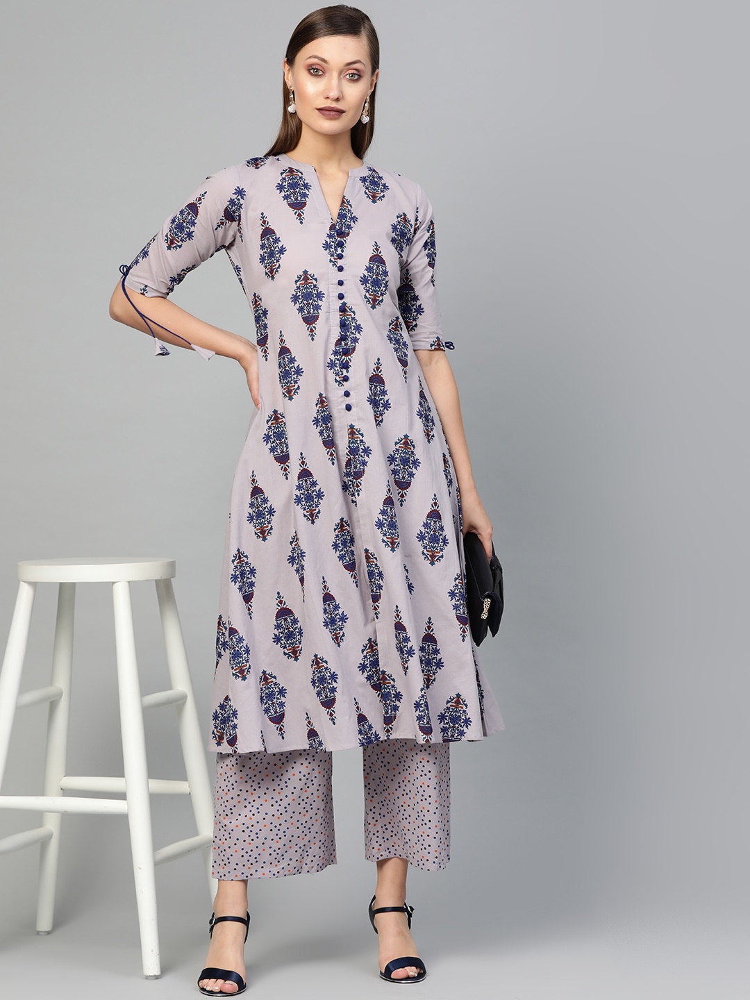 

Gerua By Libas Women Mauve Navy Blue Printed Kurta with Palazzos