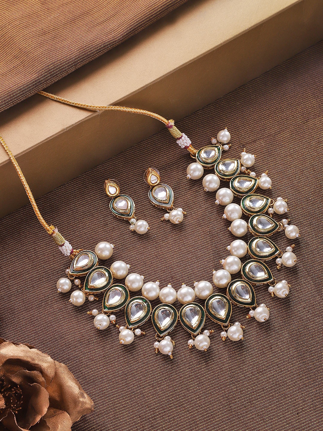 

Zobby Off-White & Green Gold-Plated Handcrafted Kundan-Studded & Beaded Jewellery Set