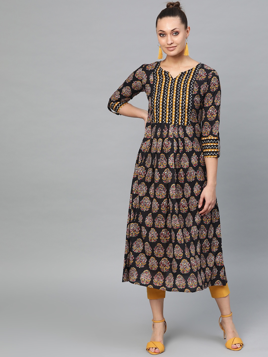 

Indo Era Women Black & Mustard Brown Printed Pleated A-Line Kurta