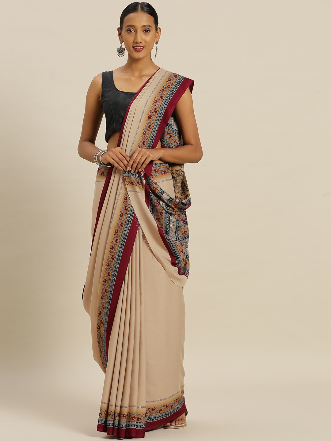 

Satrani Beige Solid Poly Crepe Saree