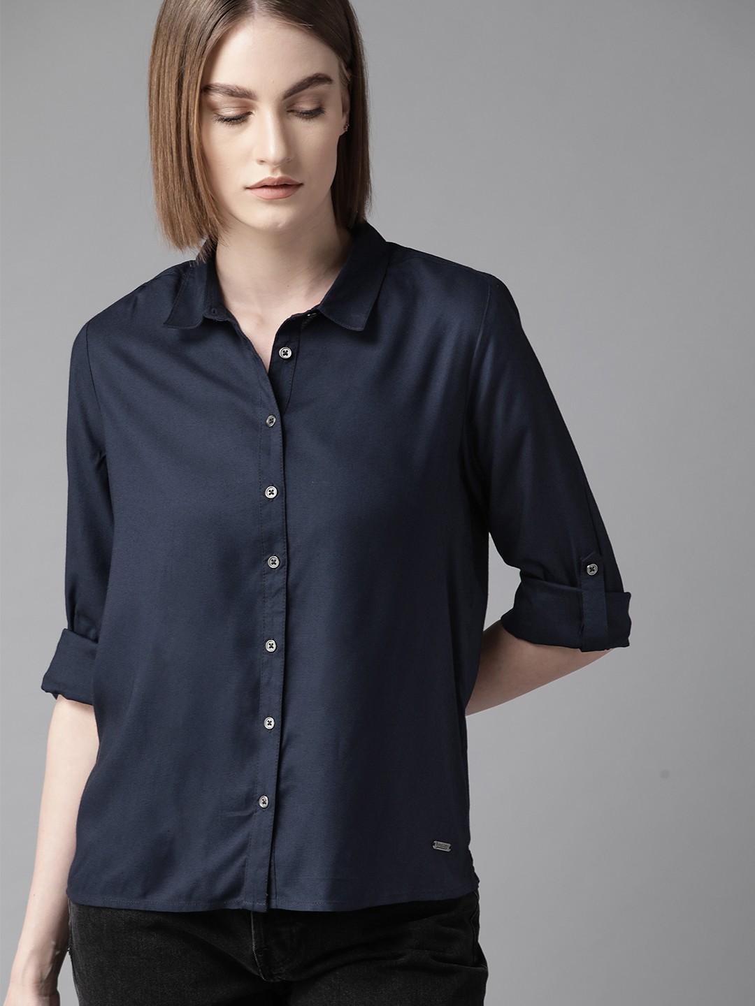 

The Roadster Lifestyle Co Women Navy Blue Regular Fit Solid Casual Sustainable Shirt