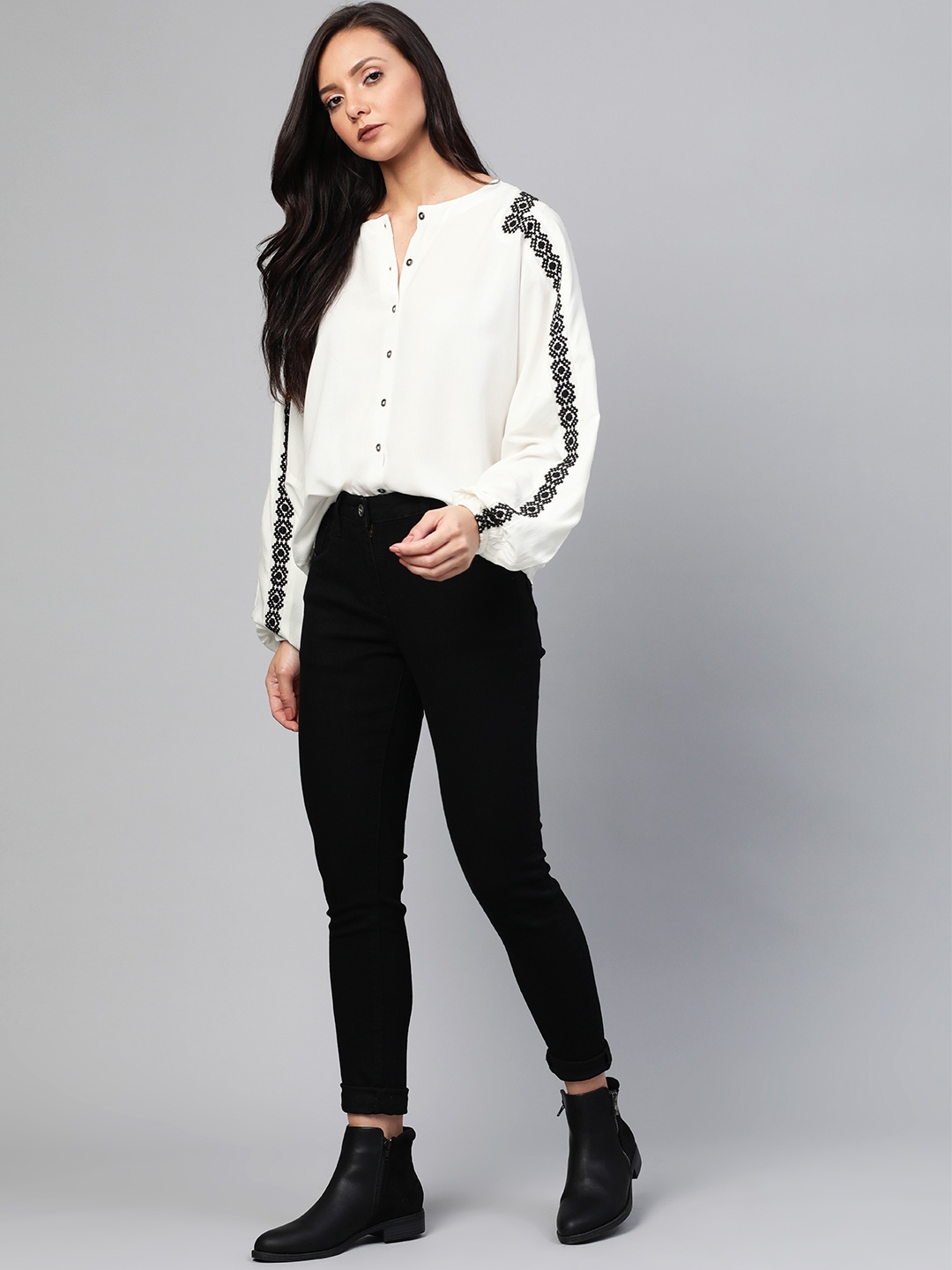 

Roadster Women Off-White Solid Top