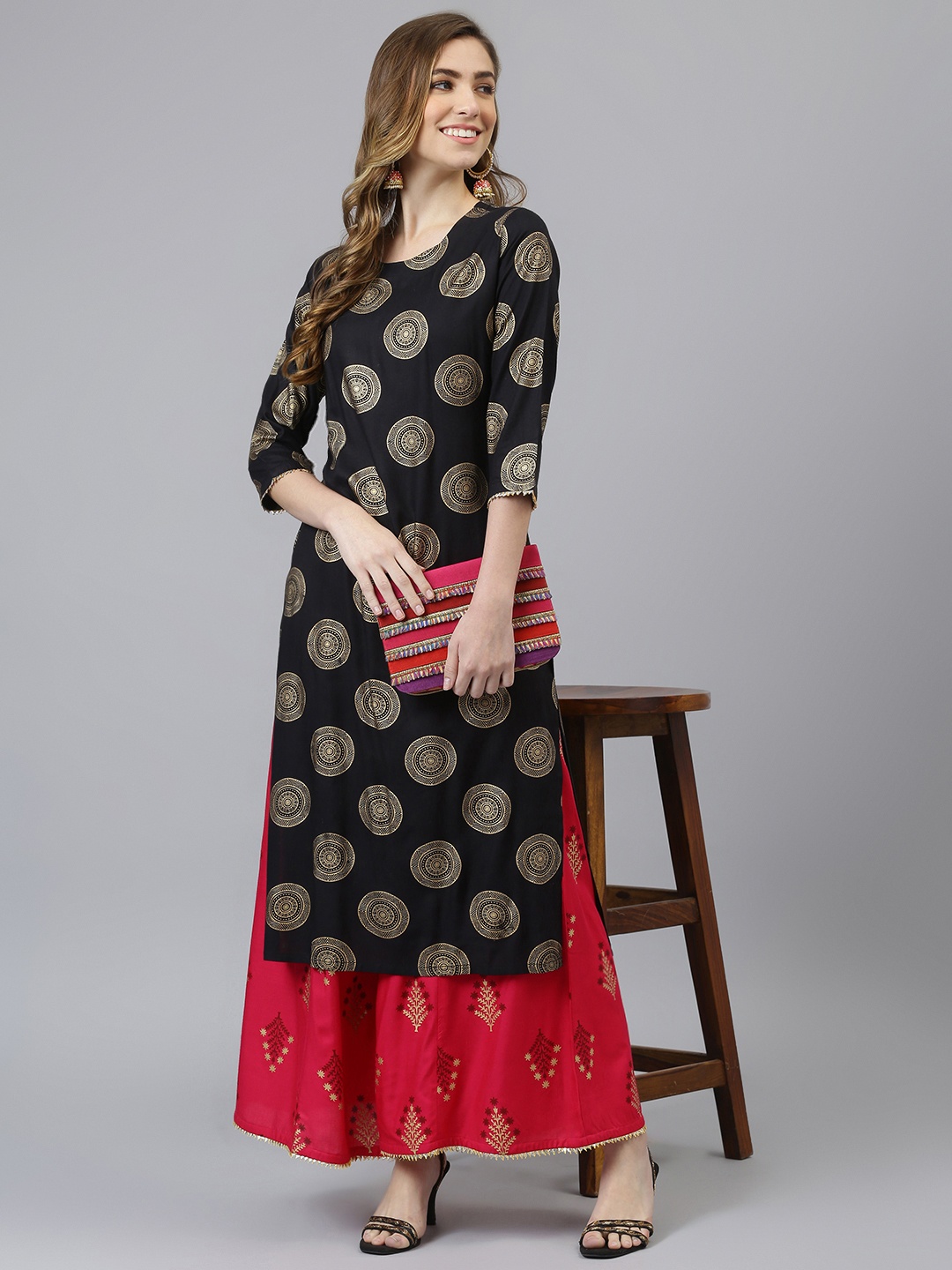 

Khushal K Women Black & Gold-Toned Printed Kurta with Palazzos