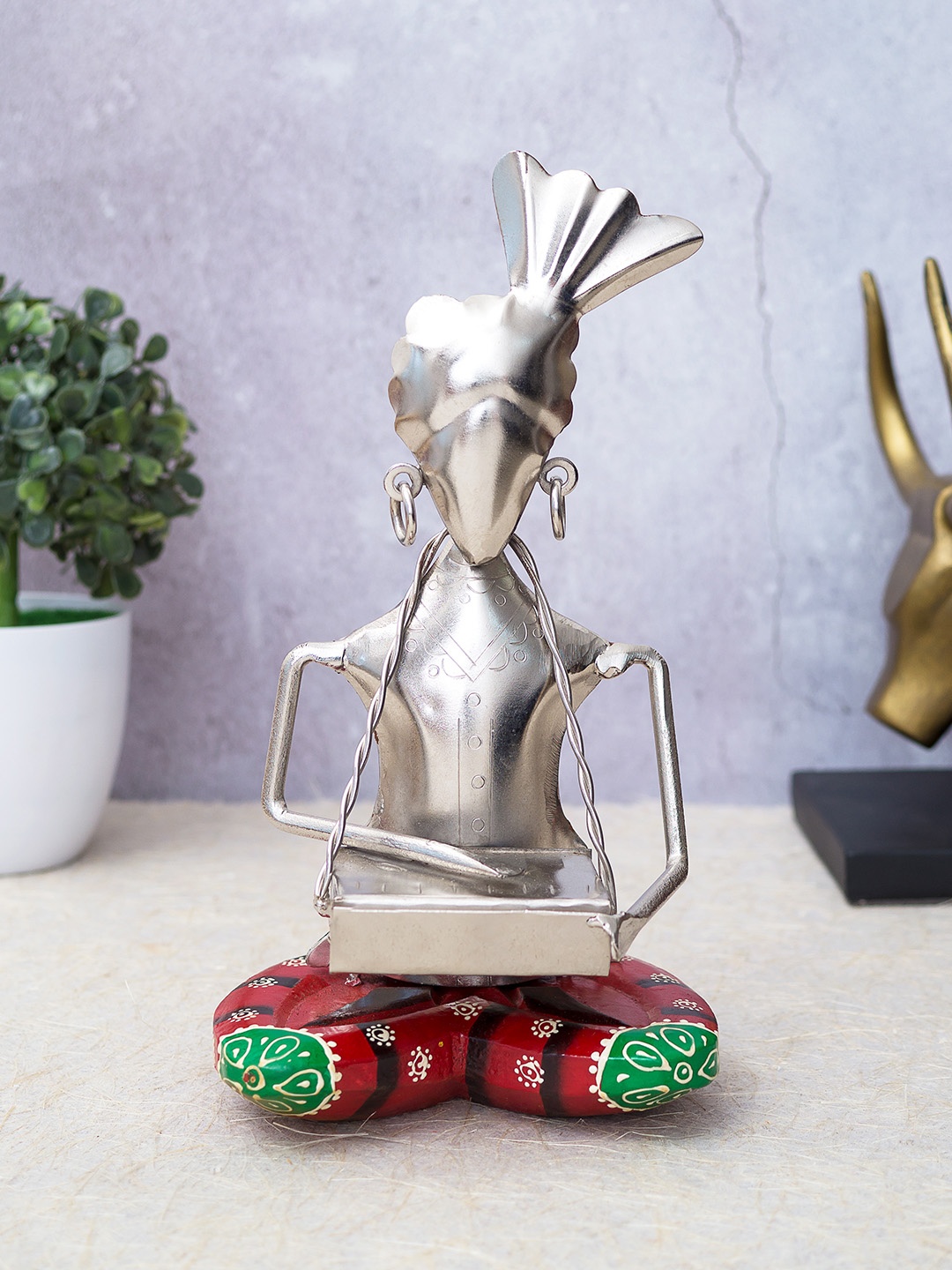 

Golden Peacock Silver-Toned & Red Iron Handcrafted Musicians Showpiece