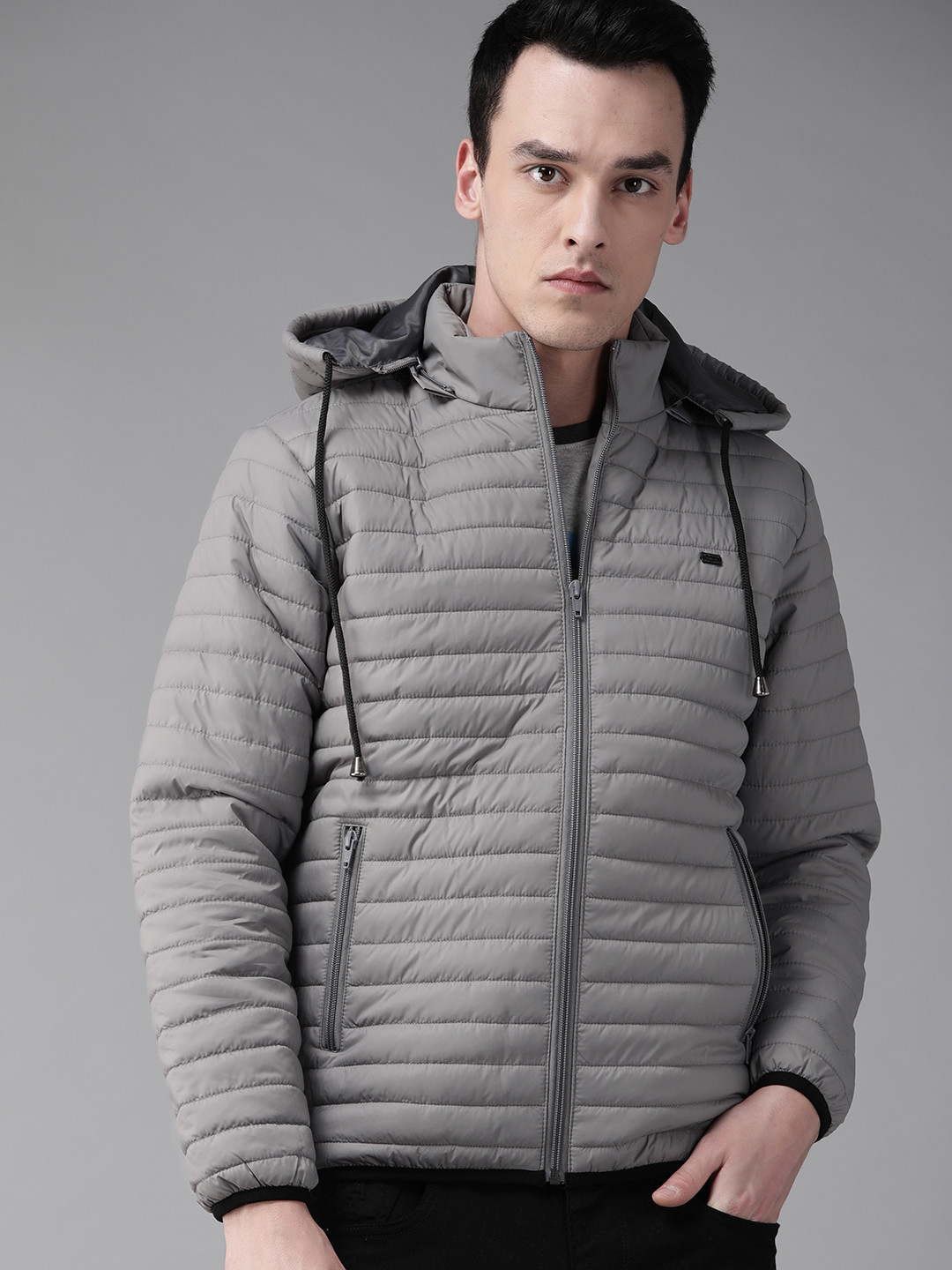 

The Roadster Lifestyle Co Men Grey Solid Quilted Jacket with Detachable Hood