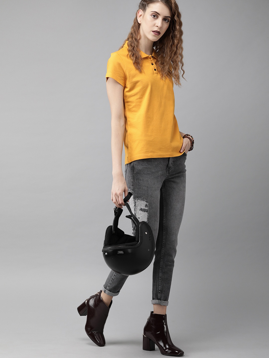 

The Roadster Lifestyle Co Women Mustard Yellow Solid Polo Collar Pure Cotton T-shirt