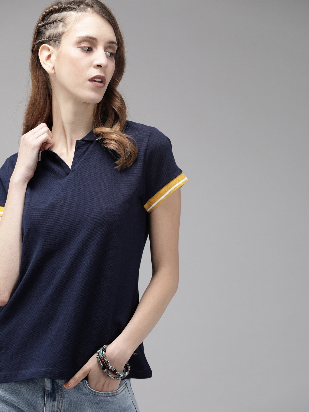 

The Roadster Lifestyle Co Women Navy Blue Solid Polo Collar Pure Cotton T-shirt