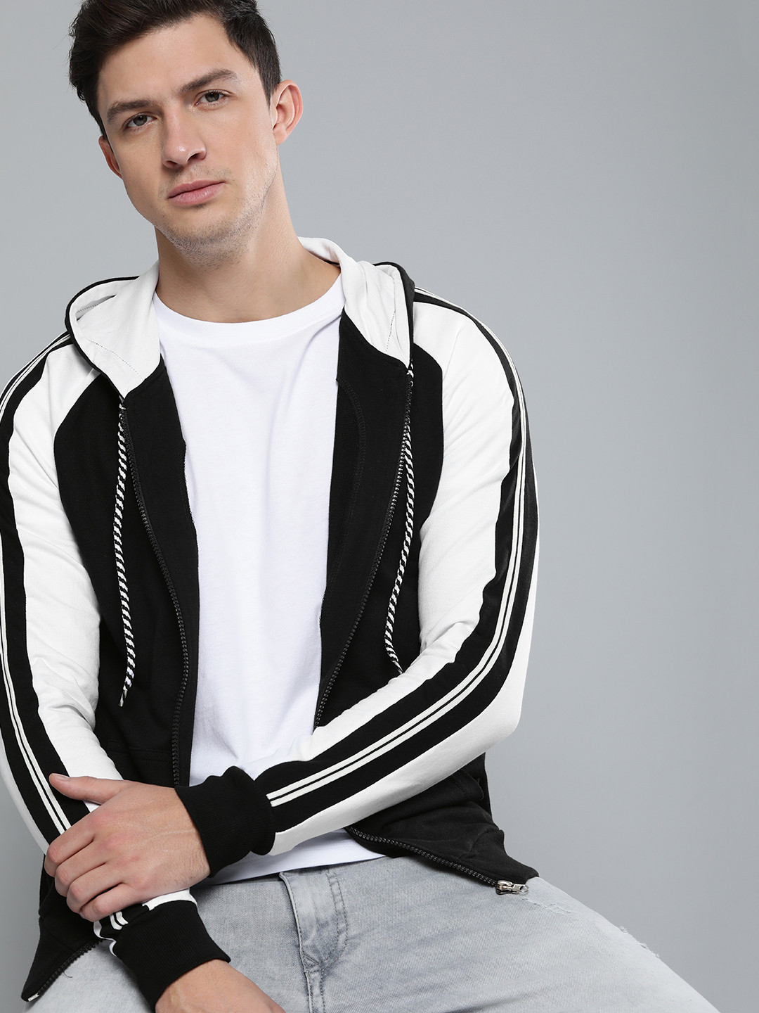 

Difference of Opinion Men Black & White Solid Hooded Sweatshirt