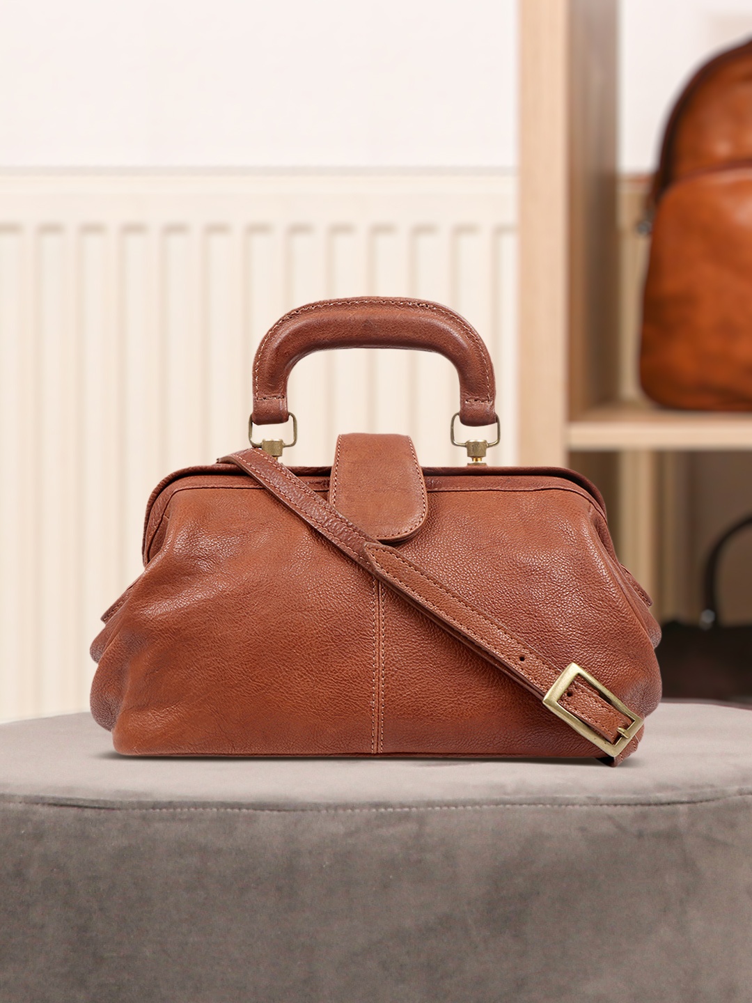 

Hidesign Tan Solid Leather Handheld Bag