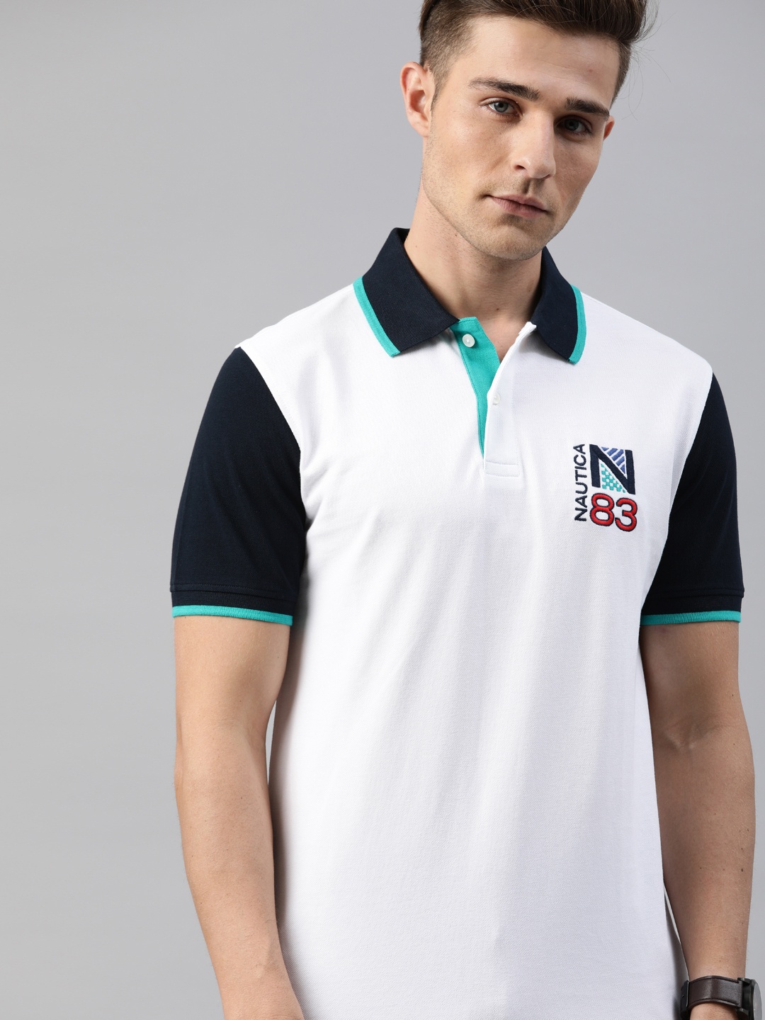 

Nautica Men White Solid Polo Collar Embroidered Pure Cotton T-shirt