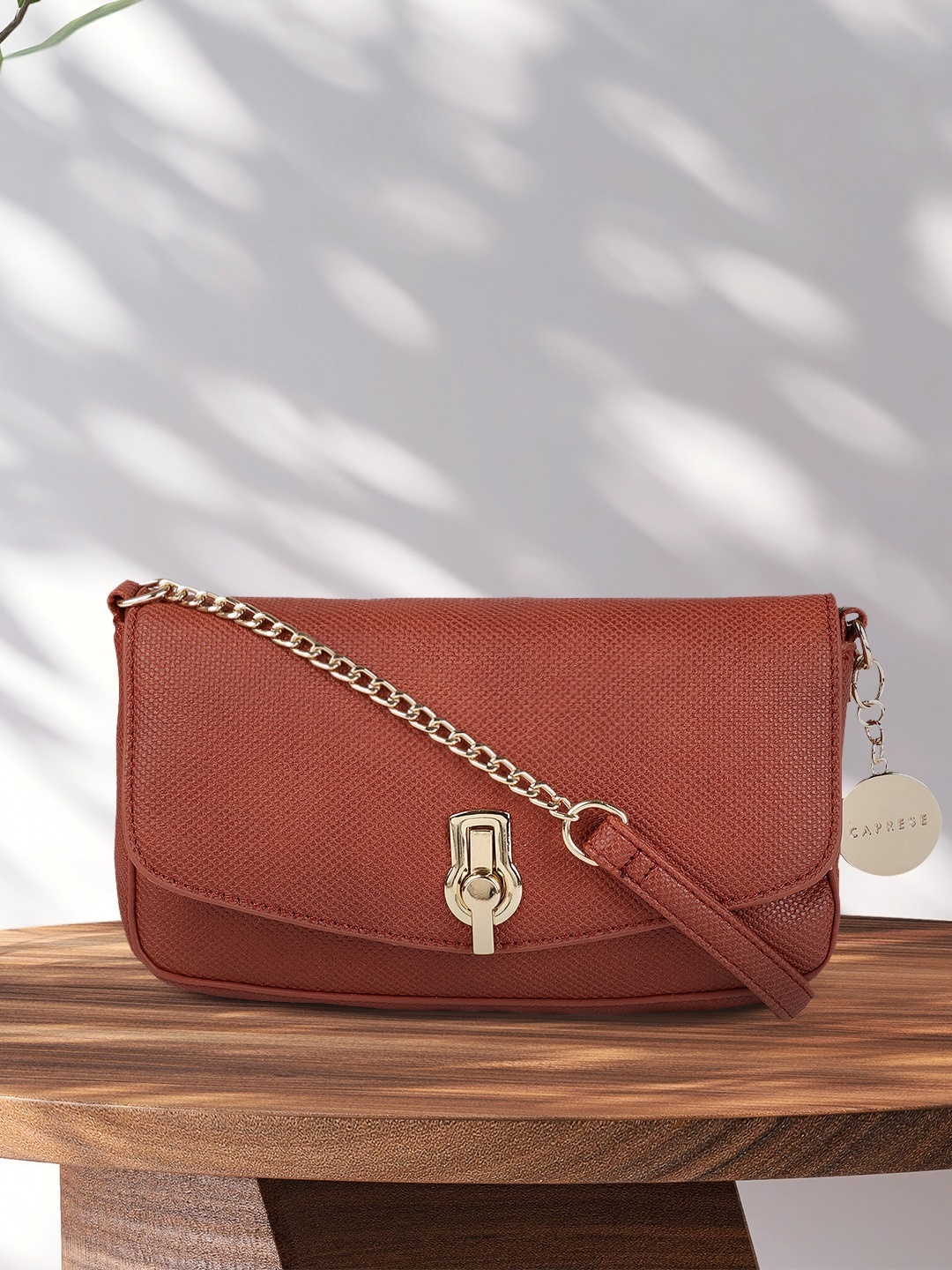 

Caprese Tan Brown Textured Sling Bag