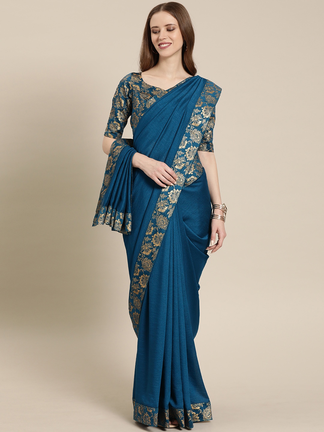 

Inddus Teal Blue Solid Silk Blend Saree