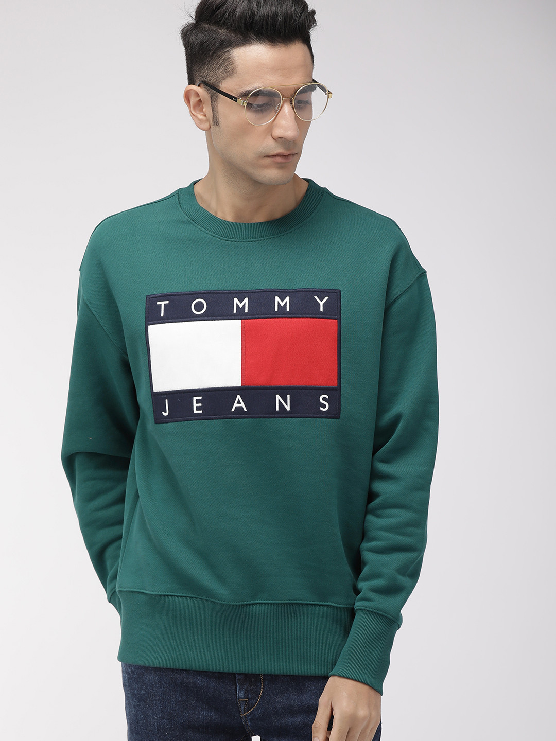 

Tommy Hilfiger Men Teal Green Solid Embroidered Sweatshirt