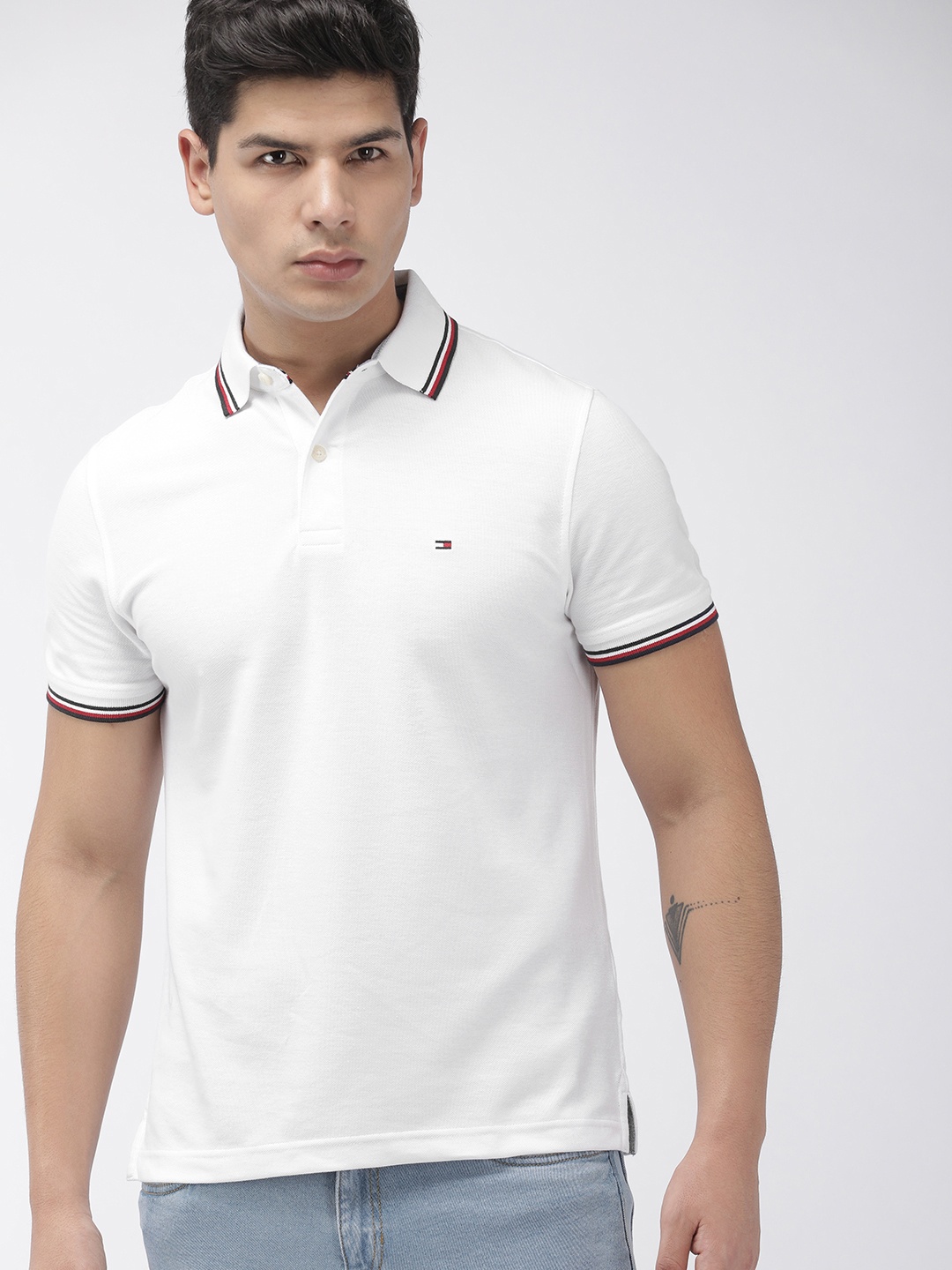 

Tommy Hilfiger Men White Solid Polo Collar T-shirt