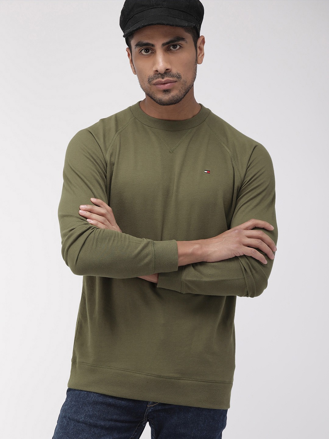 

Tommy Hilfiger Men Olive Green Solid Sweatshirt