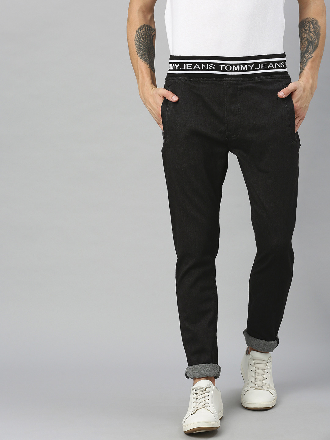 

Tommy Hilfiger Men Black Tapered Fit Mid-Rise Clean Look Jeans