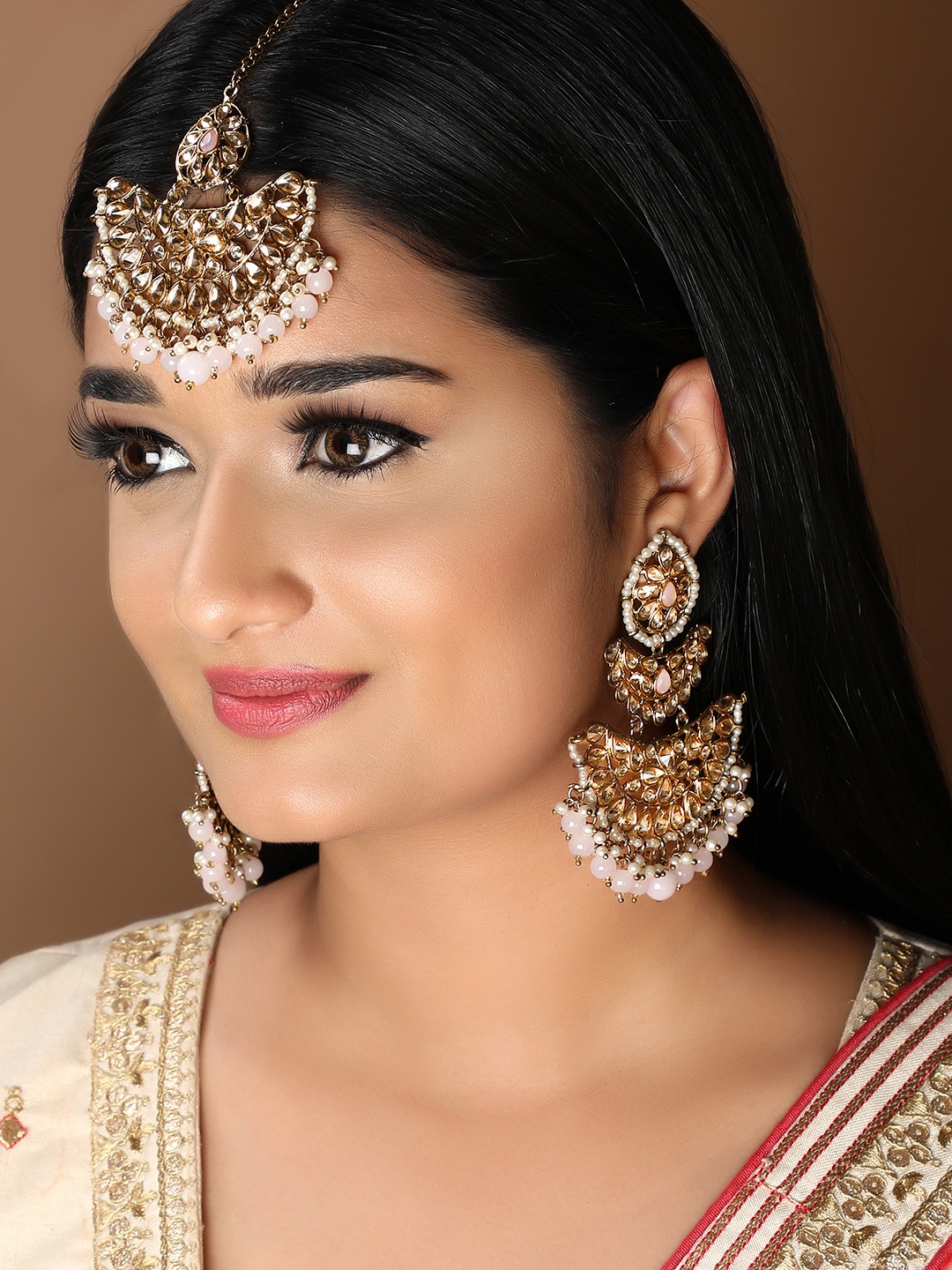 

Rubans Gold-Plated White Kundan Studded Jewellery Set