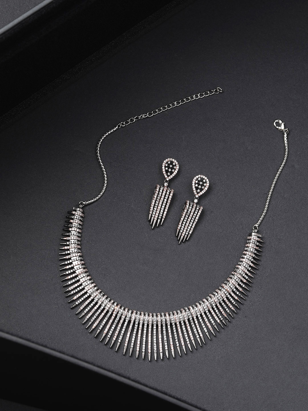 

Priyaasi Rose Gold-Toned Gunmetal-Plated Handcrafted AD Stone Studded Jewellery Set