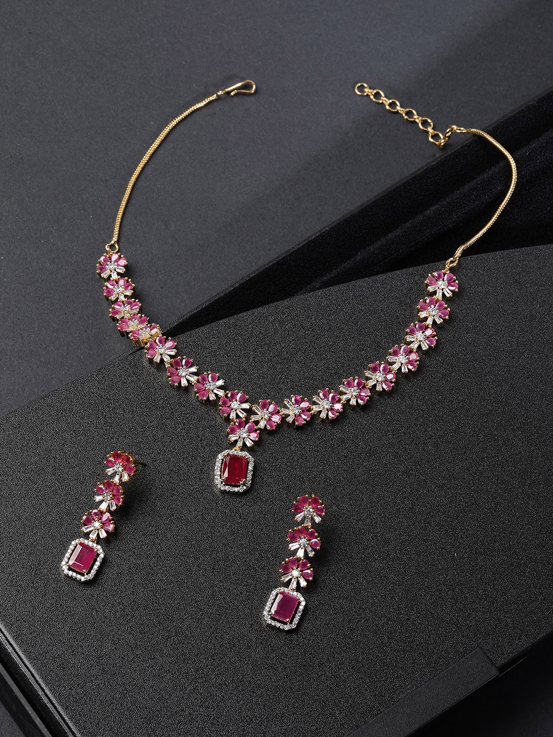 

Priyaasi Magenta Gold-Plated Handcrafted AD Stone Studded Jewellery Set