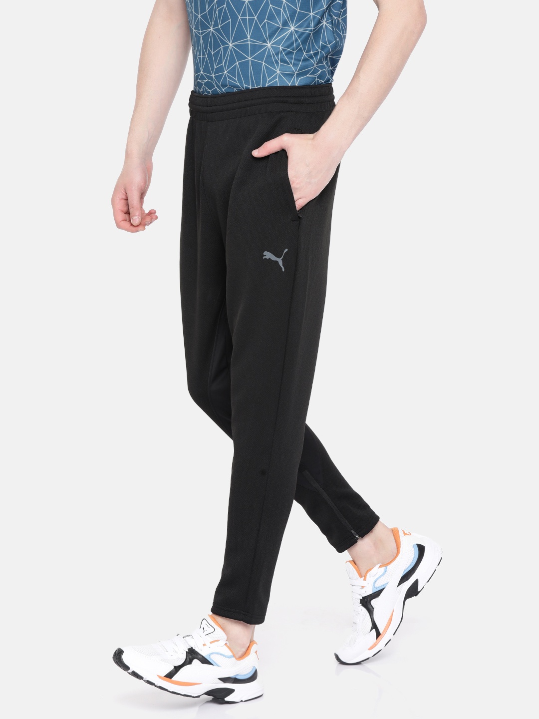 

Puma Men Black Solid WarmCell Straight Fit Rave Protect Training Track Pants