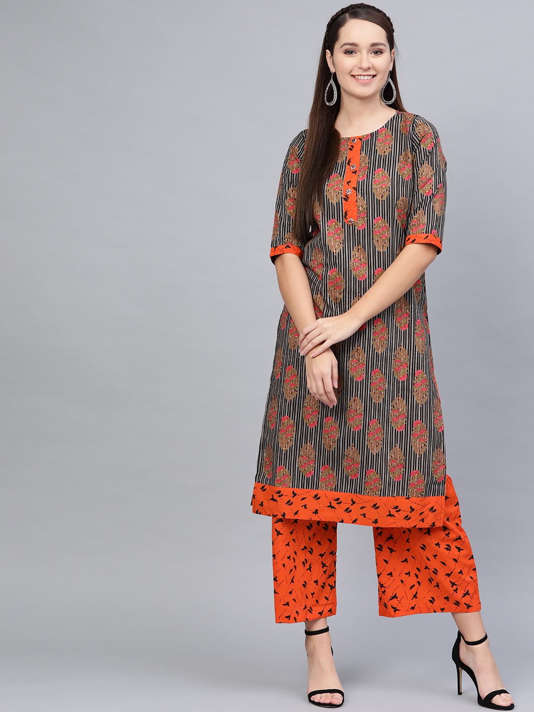 

Myshka Women Black & Orange Printed Kurta with Palazzos